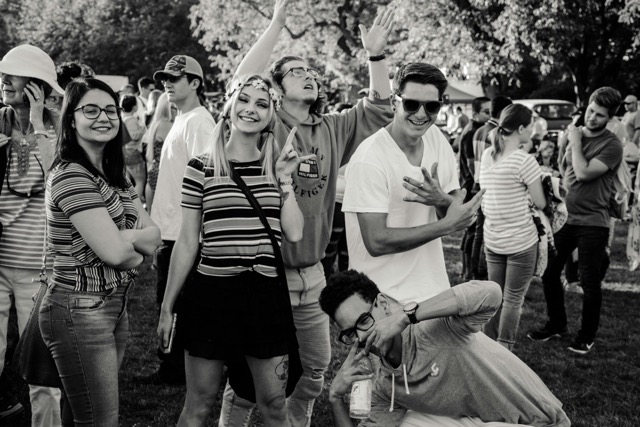Youth group members laughing and having fun at an outdoor event